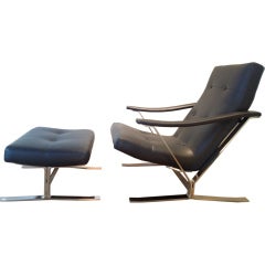 Lounge chair with ottoman designed by Milo Baughman