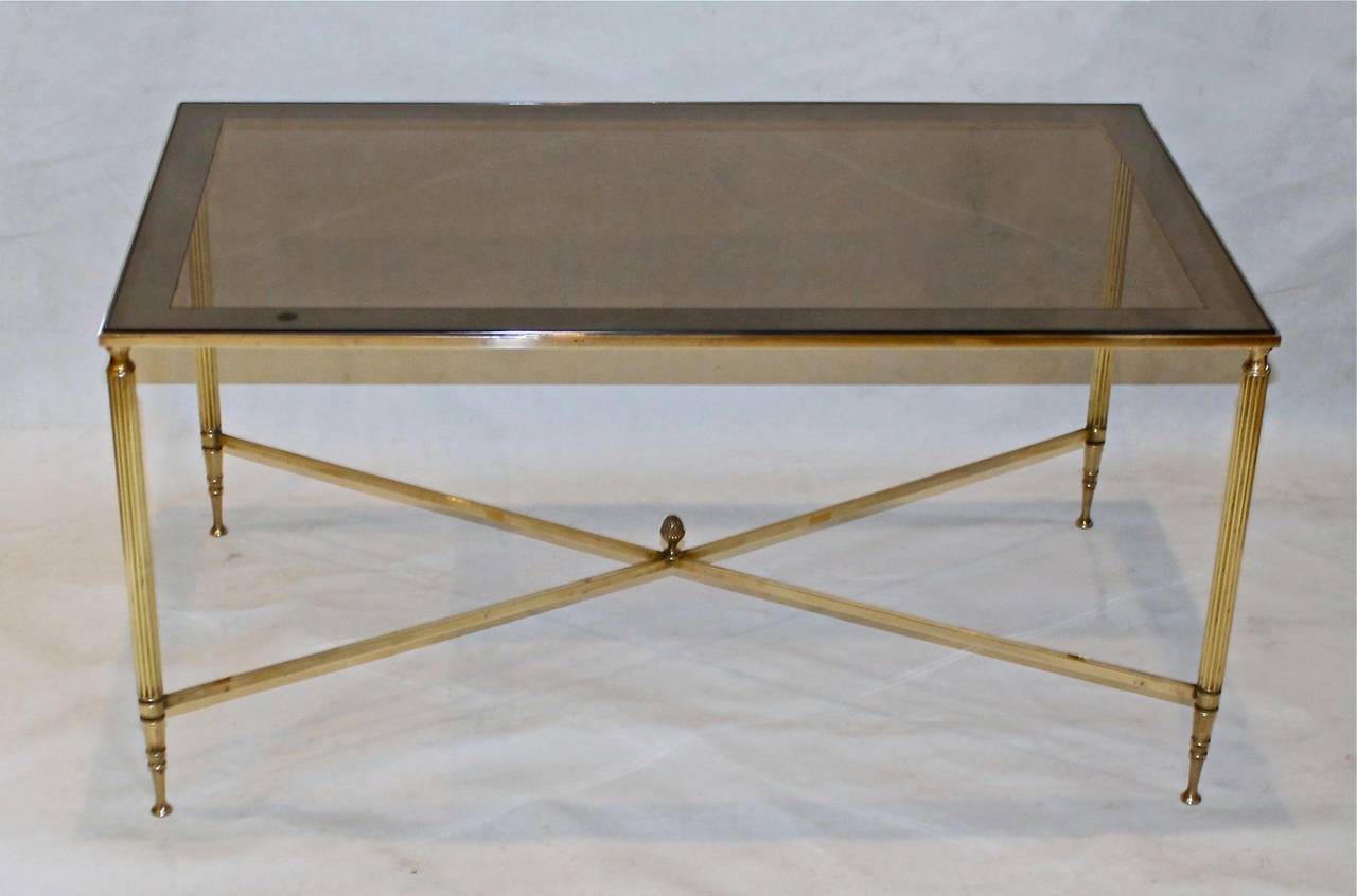 Maison Jansen style cocktail table with reeded legs, X-form stretcher and inset  smoked glass with mirrored edge top.