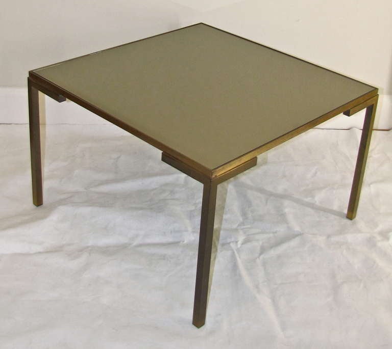 Fantastic clean lined modernist solid bronze square cocktail coffee table with newer bronzed mirrored top.