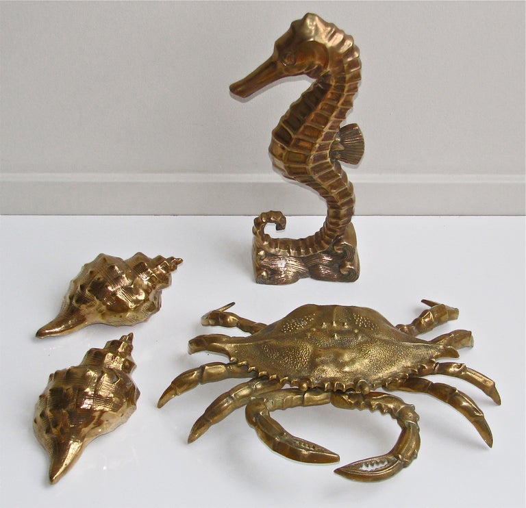 Grouping of vintage brass shell fish including:
1) Large seahorse (18