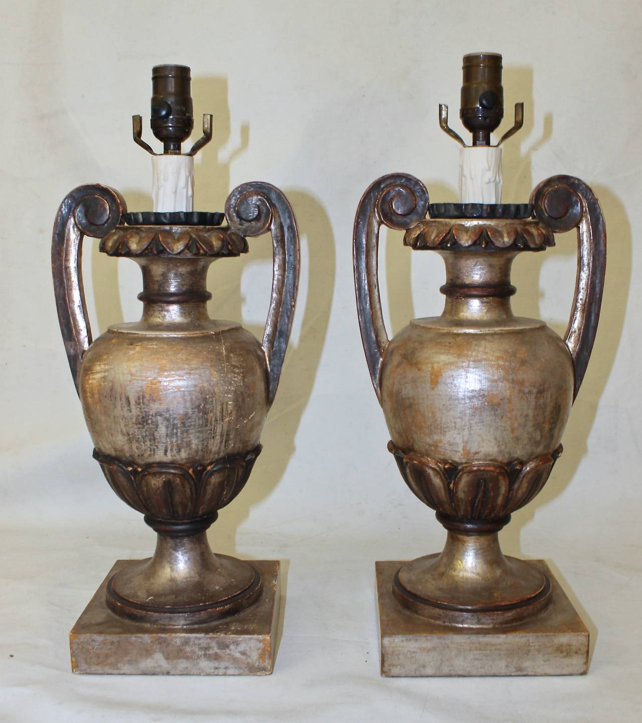 Pair of French nicely carved wood candle pricket lamps in silver water gilt finish.