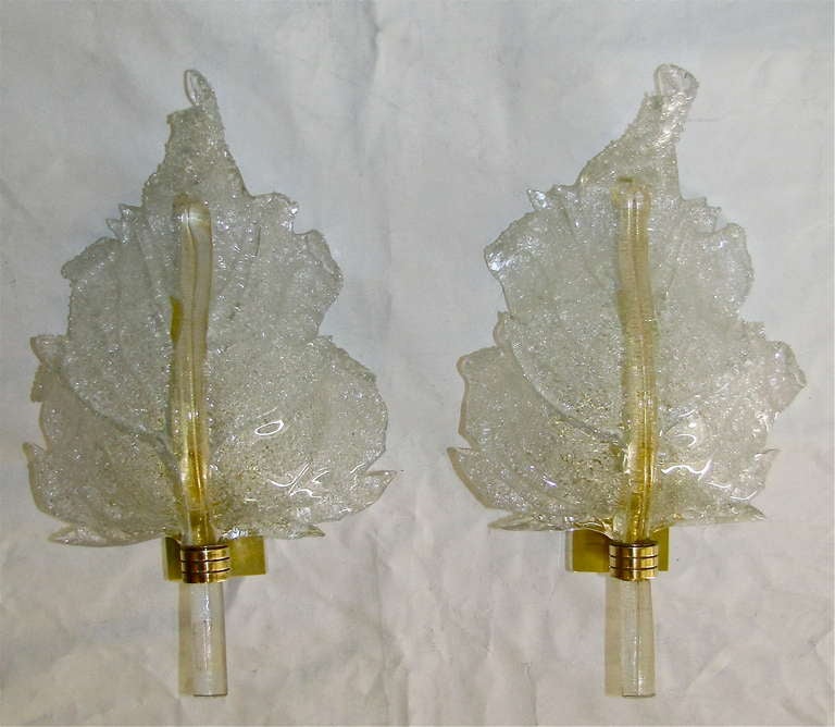 Murano pair glass wall sconces in leaf shape form, manufactured by Barovier & Toso. Glass stem infused with gold flecks and the reverse side of the leaf in the 