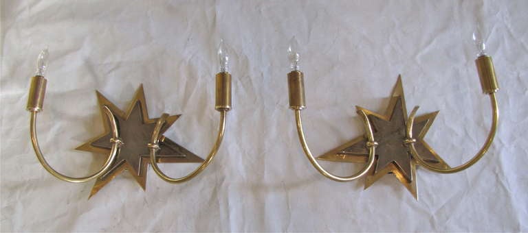 Fabulous pair of French moderne brass and graphite chrome star motif two-arm or light wall sconces, uses two 40-watt candelabra size bulbs, newly wired for US.

 