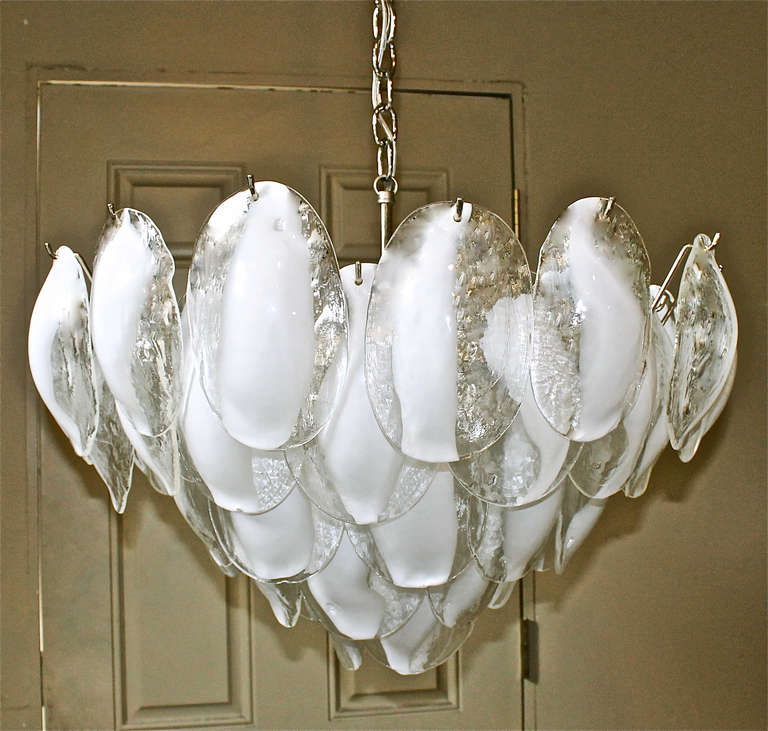 Large Italian La Murrina 11 light hand blown white and clear glass chandelier suspended on nickel plated steel frame, newly wired. Chandelier size 27