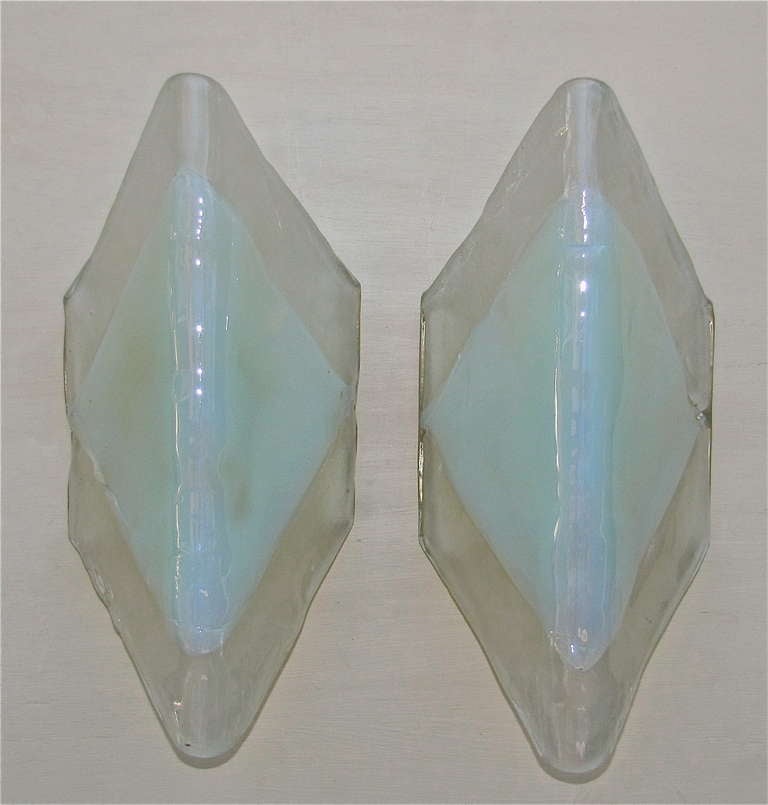 Large pair of Mazzega hand blown opalescent glass wall sconces. Each fixture uses 2 - 40 watt max bulbs. Rewired.