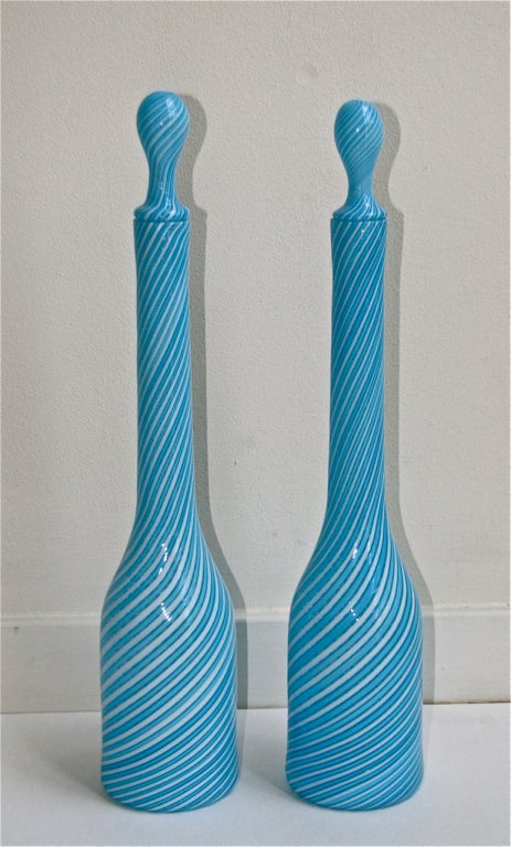 A tall and distinctive pair of Italian Murano glass decanters by Fratelli Toso in blue and white 