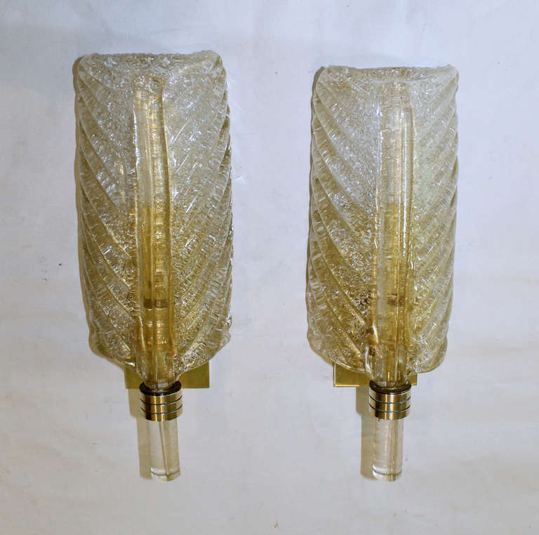 Pair of hand blown glass plume shaped wall sconces by Barovier & Toso with a 'rugiadoso' technique. Brass mountings, each sconce uses 1 - 40 watt max candelabra base bulb. Newly wired.
