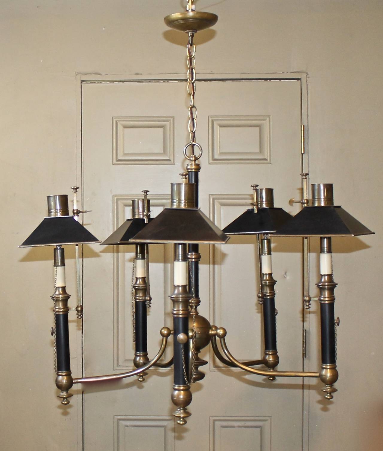 Brass and black painted Regency style chandelier by Chapman Lighting with 5 arms fitted with adjustable shades and decorative hanging chain and 