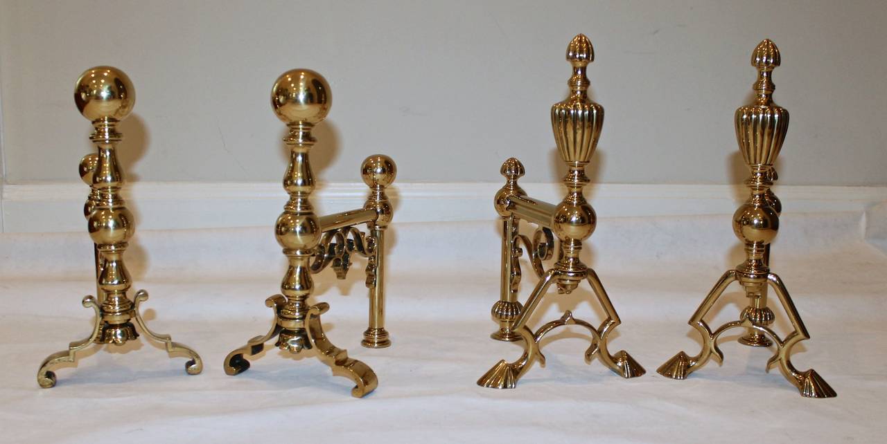 Two pairs andirons (sold separately) late 19th Century English lost wax cast brass andirons. More recently polished & lacquered.

Dimensions each pair:
Bulbous top andirons: 11.5" H X 6" W X 7.5" D
Reeded top andirons: