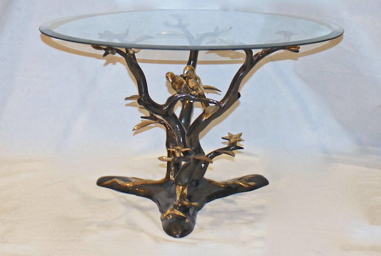 Organic tree form cast bronze cocktail or side table accented with flowers and pair birds, attributed to Willy Daro. Glass top not included; for photography purposes only. Table can accommodate round or square top.