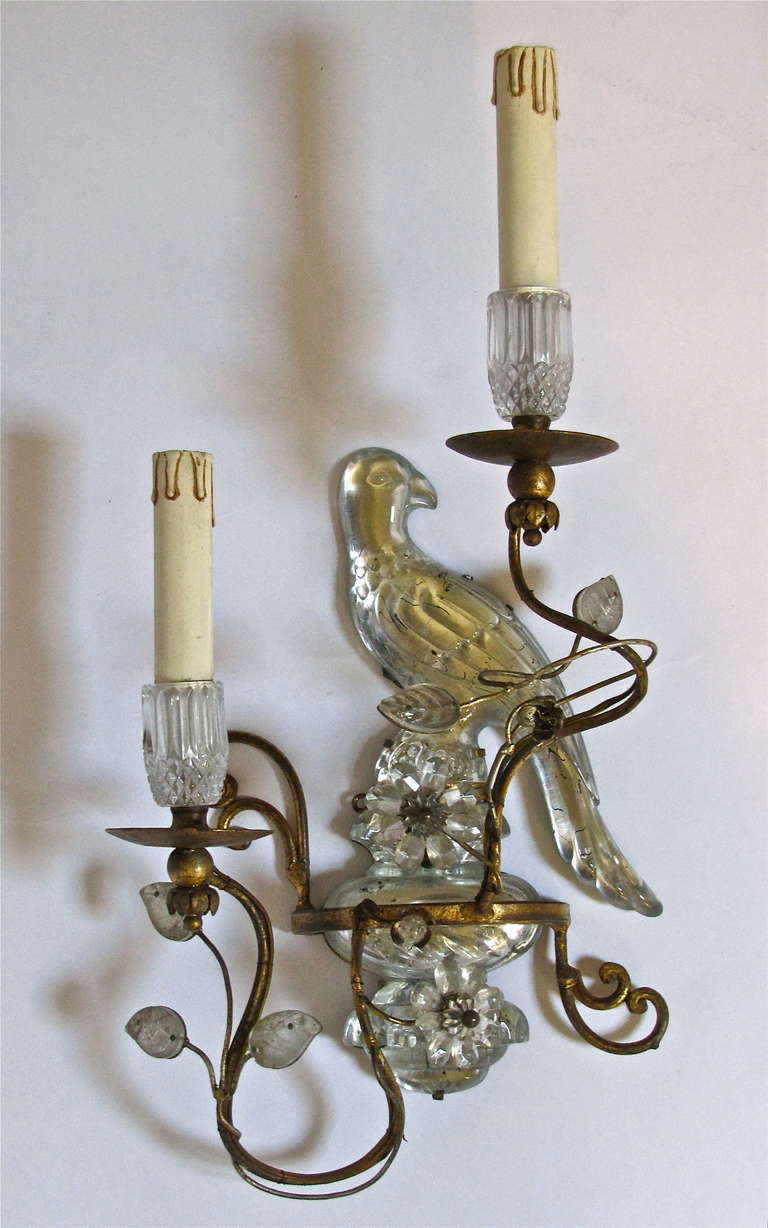 Single French gilt metal parrot/floral motif 2 light wall sconce in the style of Bagues.