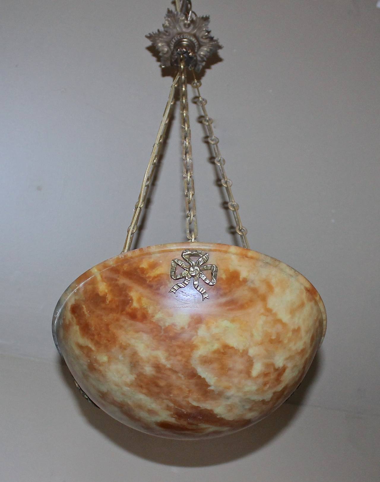 French Louis XV style alabaster chandelier or pendant with bronze fittings with rich amber and grey coloring and detailed veining. Uses single 60-watt max regular A-base bulb, newly wired.