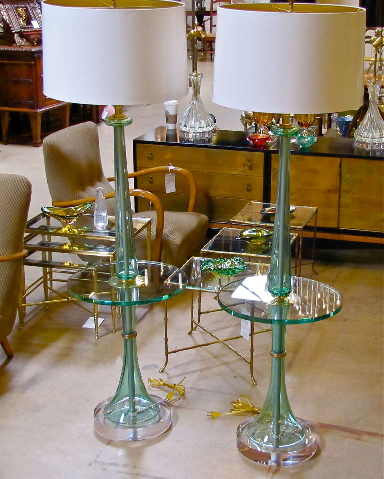 Pair of very rare and monumental Marbro glass lamp tables. Custom acrylic bases with double cluster pull chain sockets. White paper shades included.