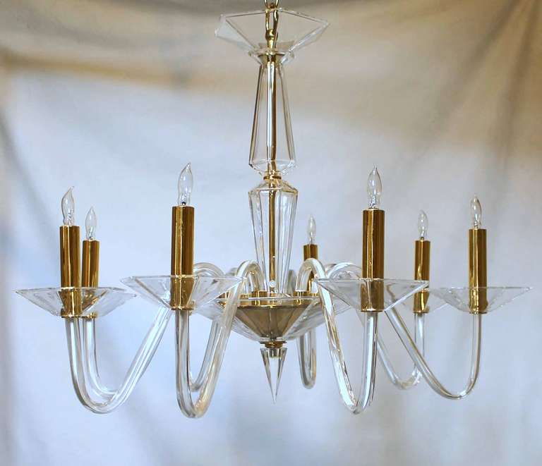 Elegant Italian 8 arm clear crystal chandelier with gold plated brass accents, newly wired.