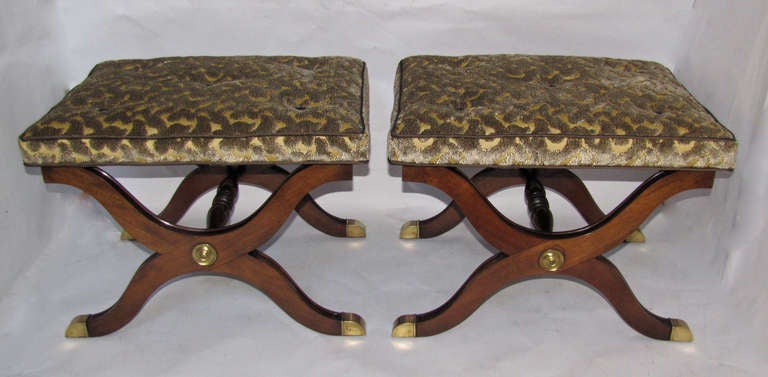 Beautiful pair of newly upholstered mahogany x-form benches with brass mounts and foot caps by Dorothy Draper for Heritage Henredon.