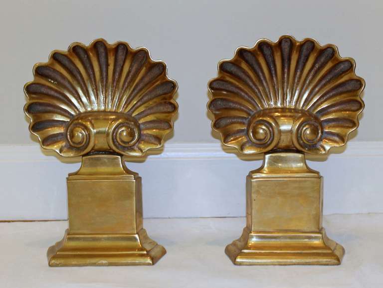 American Pair of Brass Shell Form Andirons