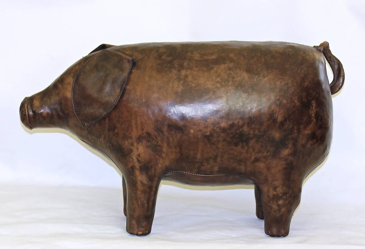 English leather animal PIG foot stool ottoman by Dimitri Omersa for Abercrombie & Fitch. Like new condition with original leather tag on the tail. A few minor scuff marks.