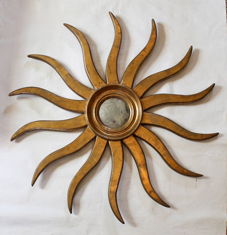 Large vintage giltwood sunburst convex wall mirror.