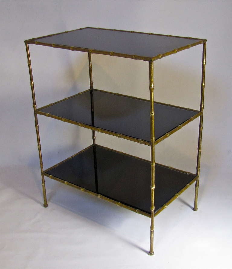 Fantastic 3-tier faux bronze bamboo end or side table with new black mirrored inset shelves. Great over all vintage patina.