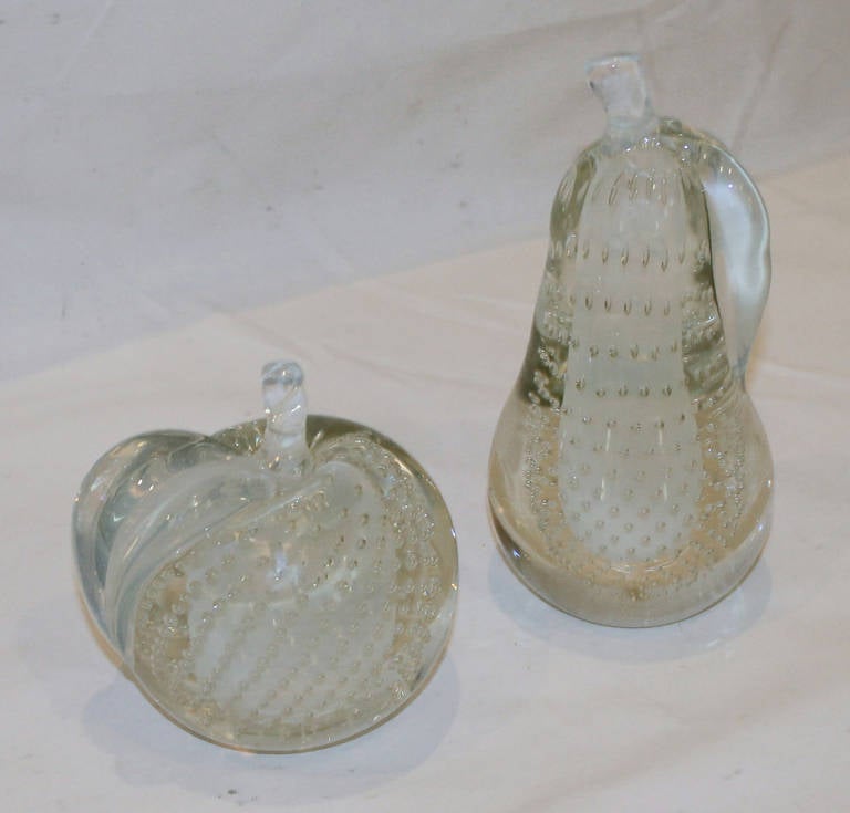 Pair of large hand blown apple and pear fruit art glass/book-ends By Salviati, glass is combination clear and opalescent surrounded with controlled bubbles. Each has Salviati sticker. 
Pear 8.5