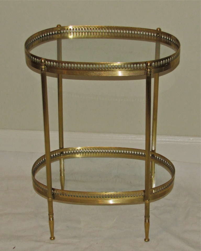 French 2 tier brass side or end table with glass shelf insets.