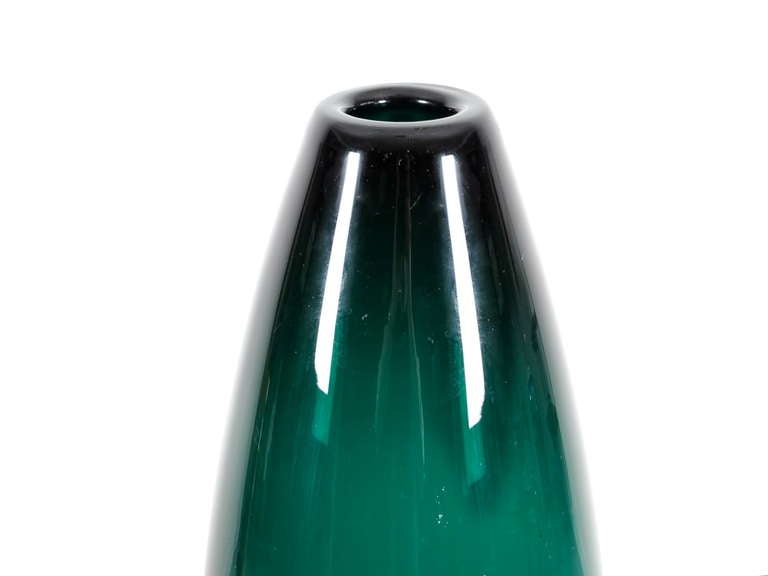 Green vase Grønland Torpedo series, number 17660 by Per Lütken for Holmegaard, produced in 1961. Tinted blown glass.Hand made. Signed.