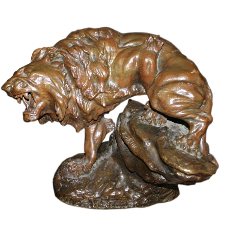 Bronze Sculpture of a Lion by T. Cartier For Sale