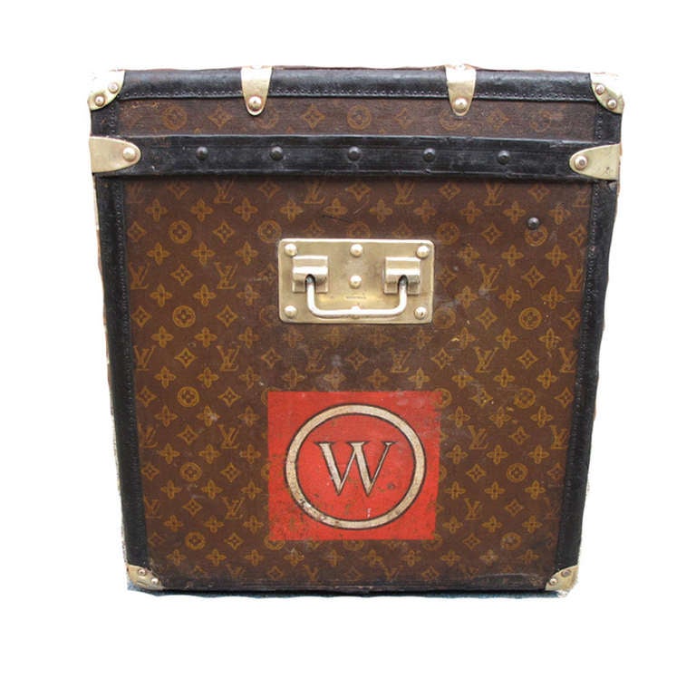 Louis Vuitton halft steamer trunk in very good vintage condition.  Exterior features monogram canvas trimmed with lozine and brass hardware.  Interior fully lined with original canvas shows signs of age but still in very good condition.