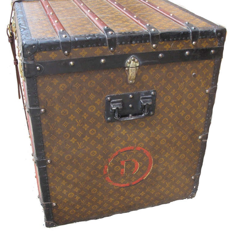 Louis Vuitton gentleman trunk in excellent vintage condition.  Exterior features signature LV monogram canvas trimmed with lozine and brass hardware.  The interior is in excellent condition fully lined with beige canvas and holds 2 full size trays,