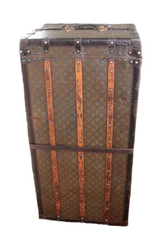 Louis Vuitton complete wardrobe steamer trunk in excellent vintage condition.  Exterior features signature LV monogram canvas trimmed with lozine and brass hardware.  Interior holds 6 drawers, 1 shoebox, 7 hangers with one cover and 3 clothing