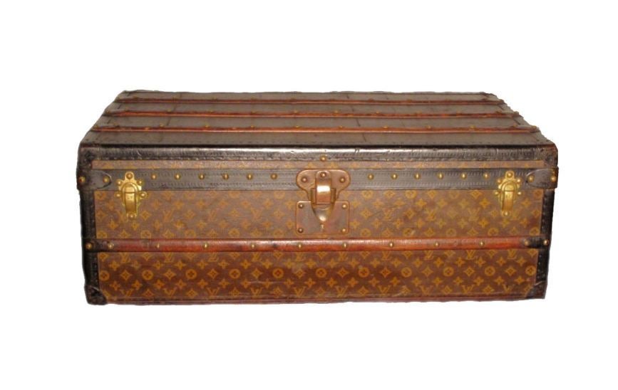 Louis Vuitton half trunk owned by Mistinguett in very good vintage condition.  Exterior features signature LV monogram canvas trimmed with lozine and brass hardware.  Interior in excellent condition complete with one storage tray.  This piece can be