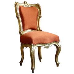 A French giltwood napoleon III Louis XV style chair