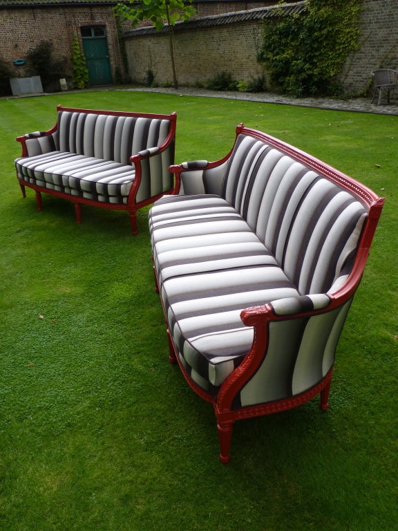 False pair of French red lacquered sofas around 1920