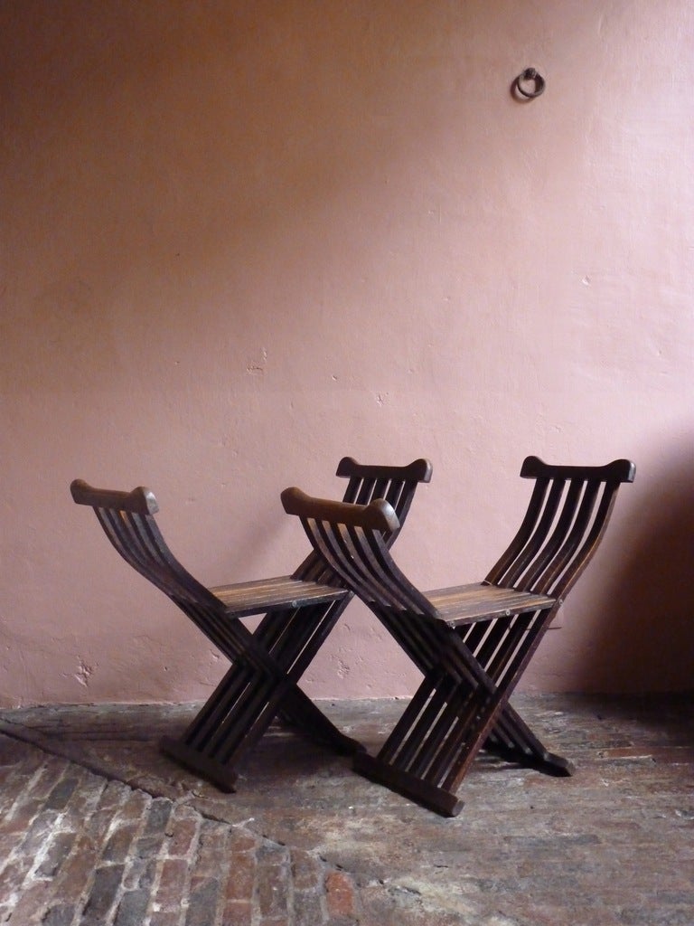 Pair of early 20 th century oak X folding chairs France
