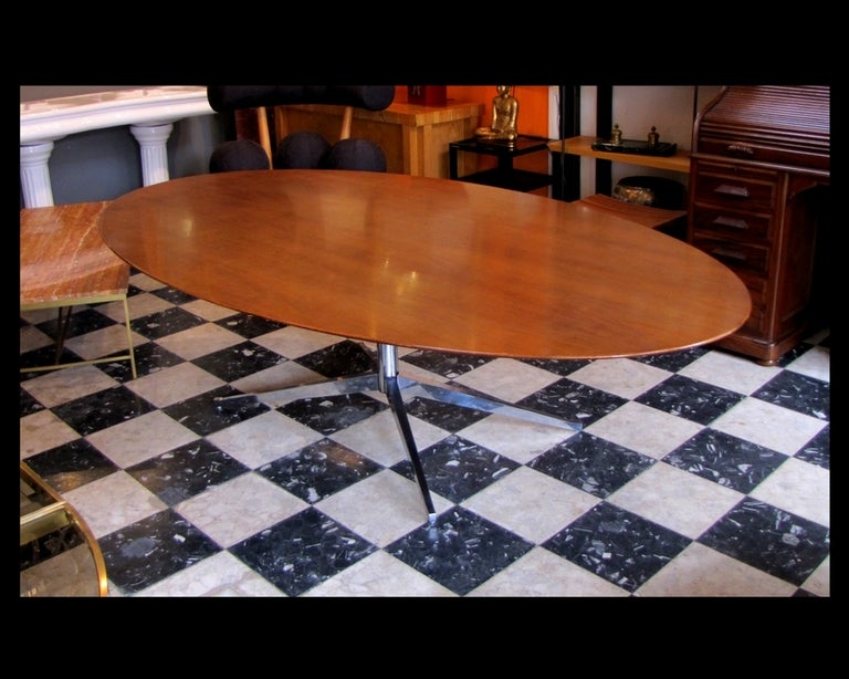 Florence Knoll oval table for Knoll circa 1960,  wallnut top, chrome plated steel base.