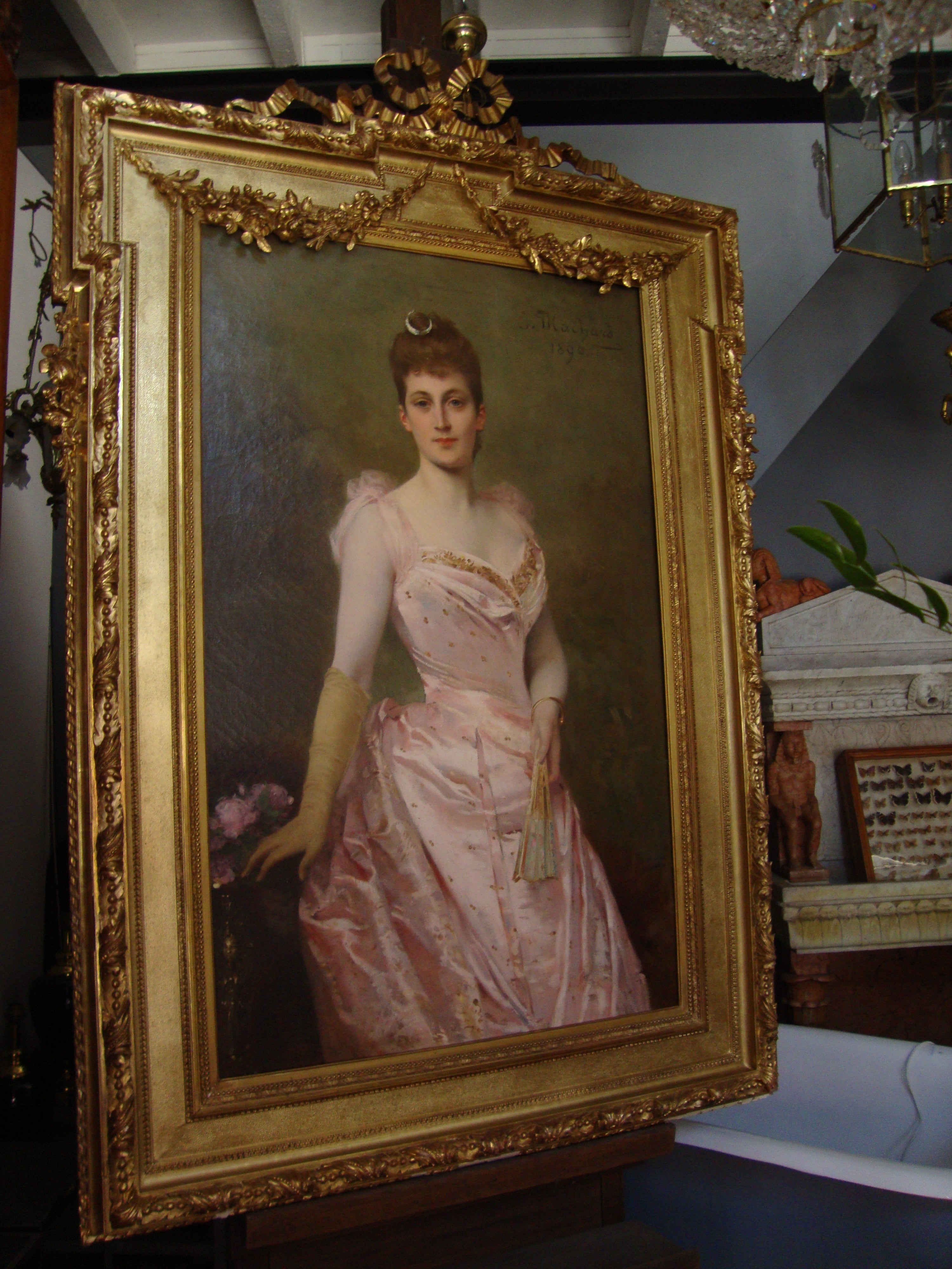 "Young woman in pink dress with wide range"