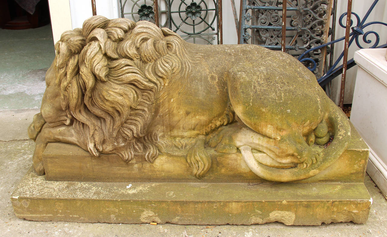 Pair of large sleeping lions in hand carved stone after Canova, France XXth C