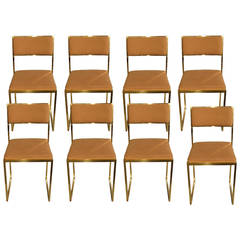 Eight 1970s Chairs in Polished Brass