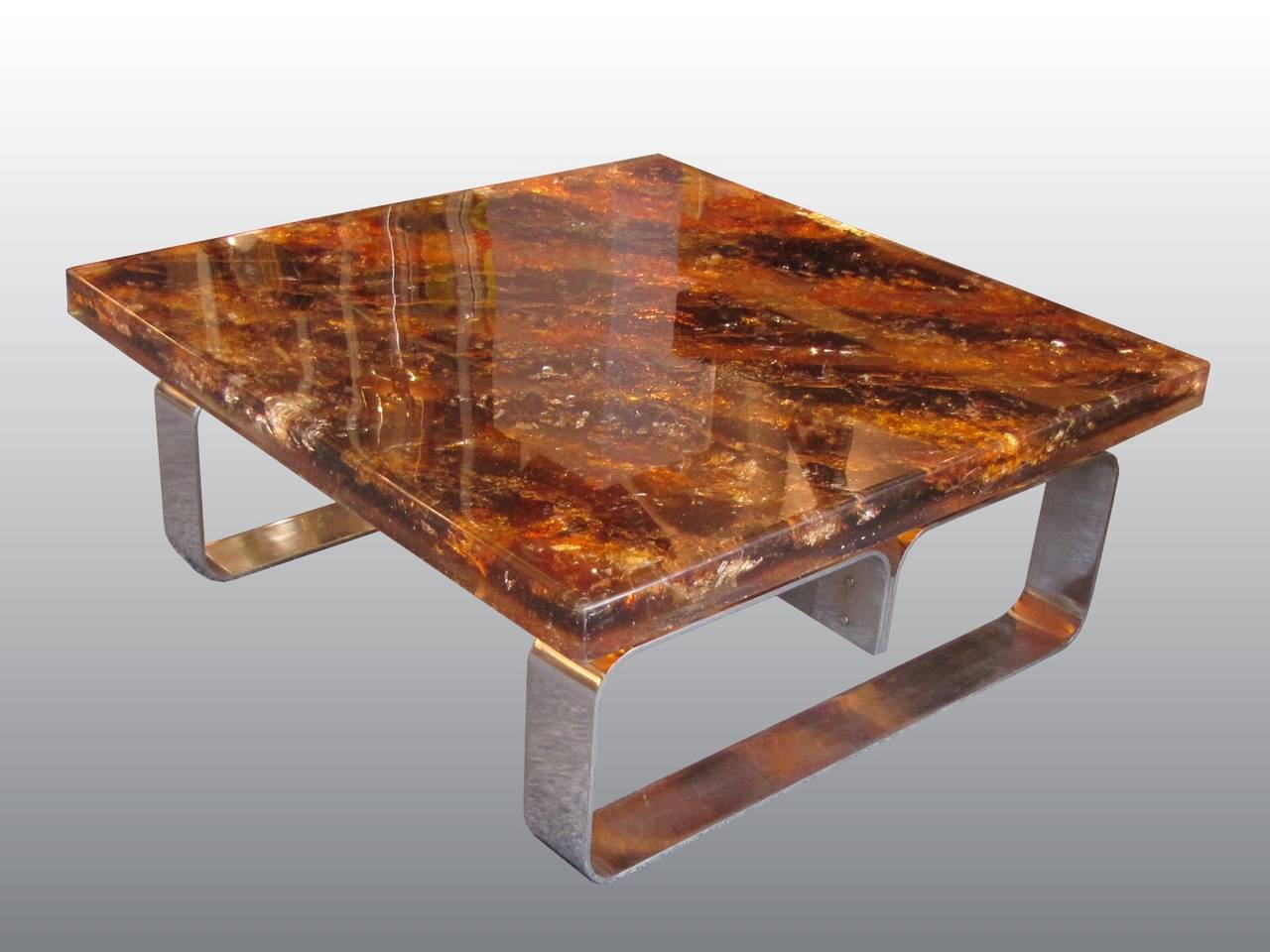 Beautiful coffee table by Gilles Charbin, tray in resin with inclusions, base in polished steel. Unique piece.