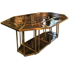 Beautiful 1970's Dining Table in brass and beveled smoked glass