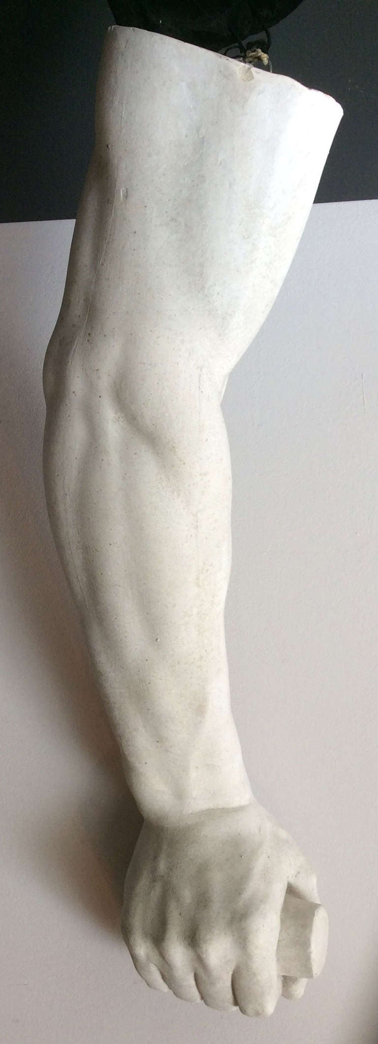 Arm with closed hand in plaster. France XIXth century