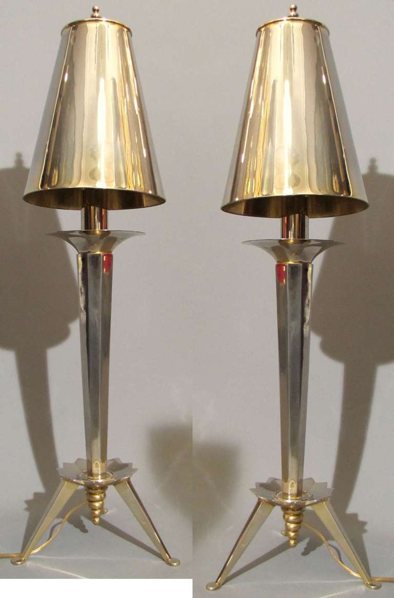 Pair of rare table lamps in gilded and silvered brass and bronze.