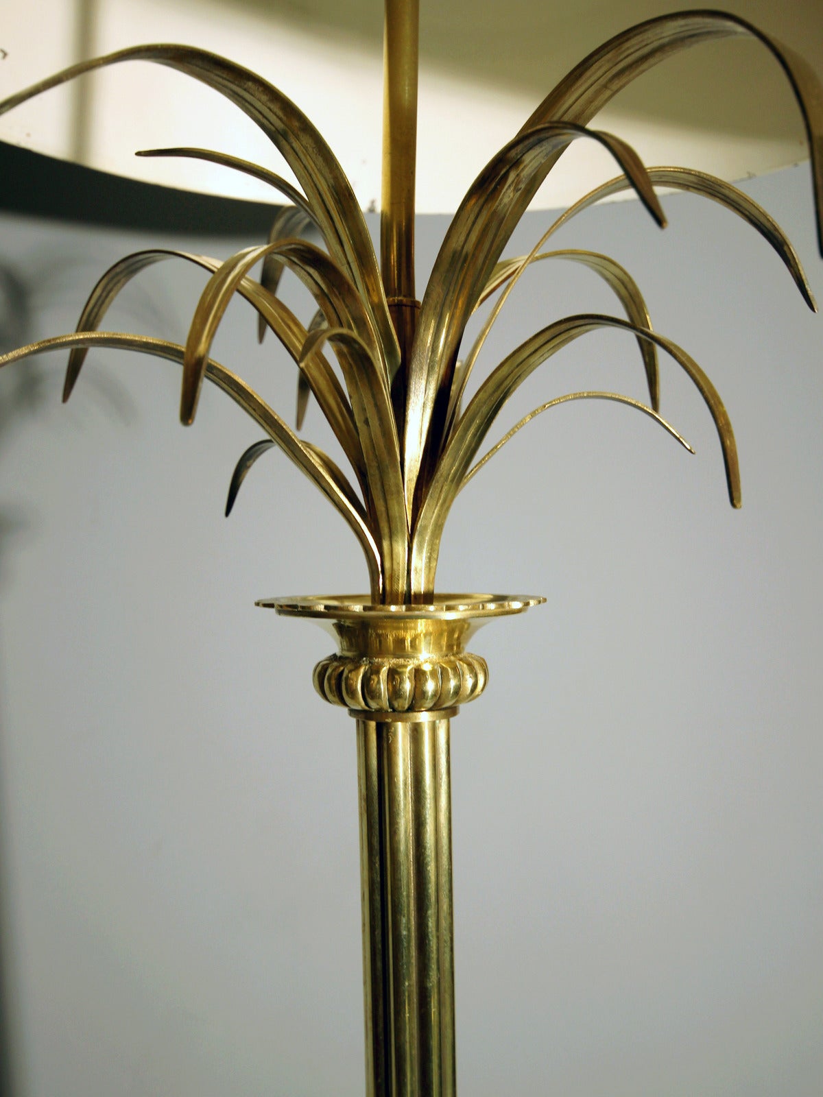 1970s floor lamp in polished and black lacquered brass, with original lampshade in lacquered metal. Very good quality. Unsigned.