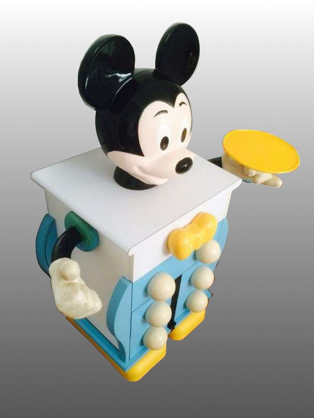 1980s Mickey Mouse commode in plywood and plastic with four drawers, designed by PIerre Colleu (born in 1948) and edited by Starform. 

Moulded plastic. Colored plastic laminate on wood.