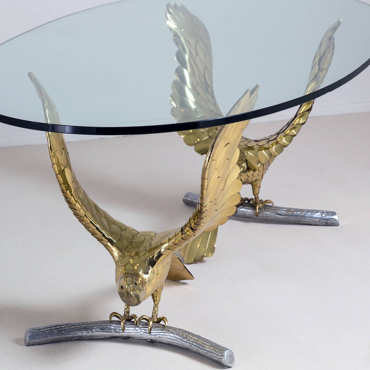 Elegant large dining table by Alain Chervet, handmade in brass and polished wrought iron, circa 1970-1980. Stamped on the base.

Each base measure 28.74 in x 24.41 in x 28.34 in height.
The actual glass top measure 6 ft. 10.7 in but it's possible to