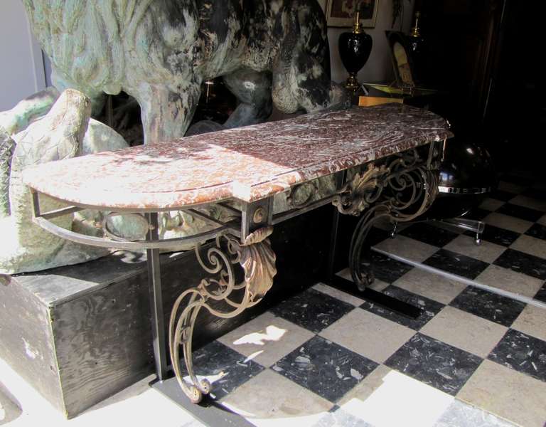 Beautiful console in the Louis XV style, base in painted and gilded wrought iron, original top in 