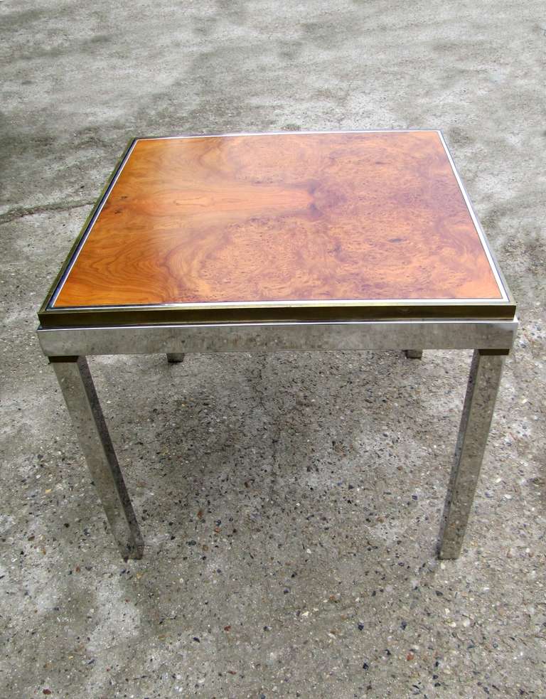 Beautiful game table in the manner of Willy Rizzo, in good condition. The reversible tray has a side plated in varnished walnut burl and the other covered with beige cloth. Chrome metal and brass are in very good condition and need  just to clean.