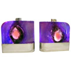 Two luminous sculptures or lamp bases in resin and chrome