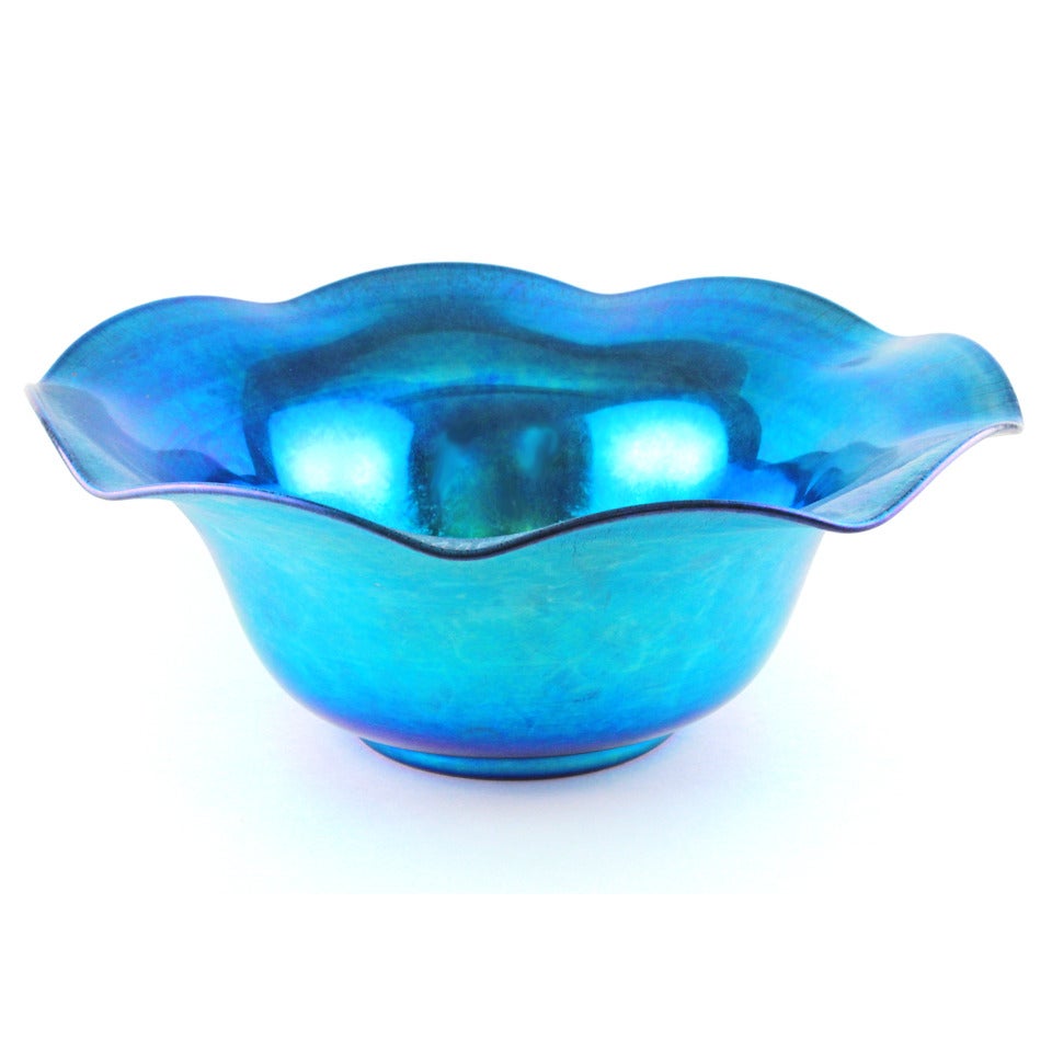 Steuben, American, circa 1920-1930s. This gorgeous Steuben centerpiece is a stellar example of American Art Glass. It is the finest, brightest and most intensely colored example of Blue Aurene I have ever seen. The look is American Decorative Arts