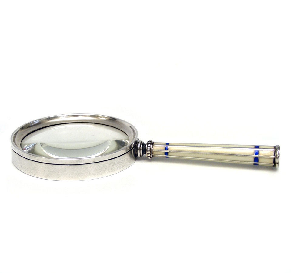 This impeccably designed enamel on silver magnifying glass is a brilliant example of the Austrian secessionist movement. Superbly fabricated, the enamel decoration is particularly refined. Often collaborating on projects with Koloman Moser and Josef